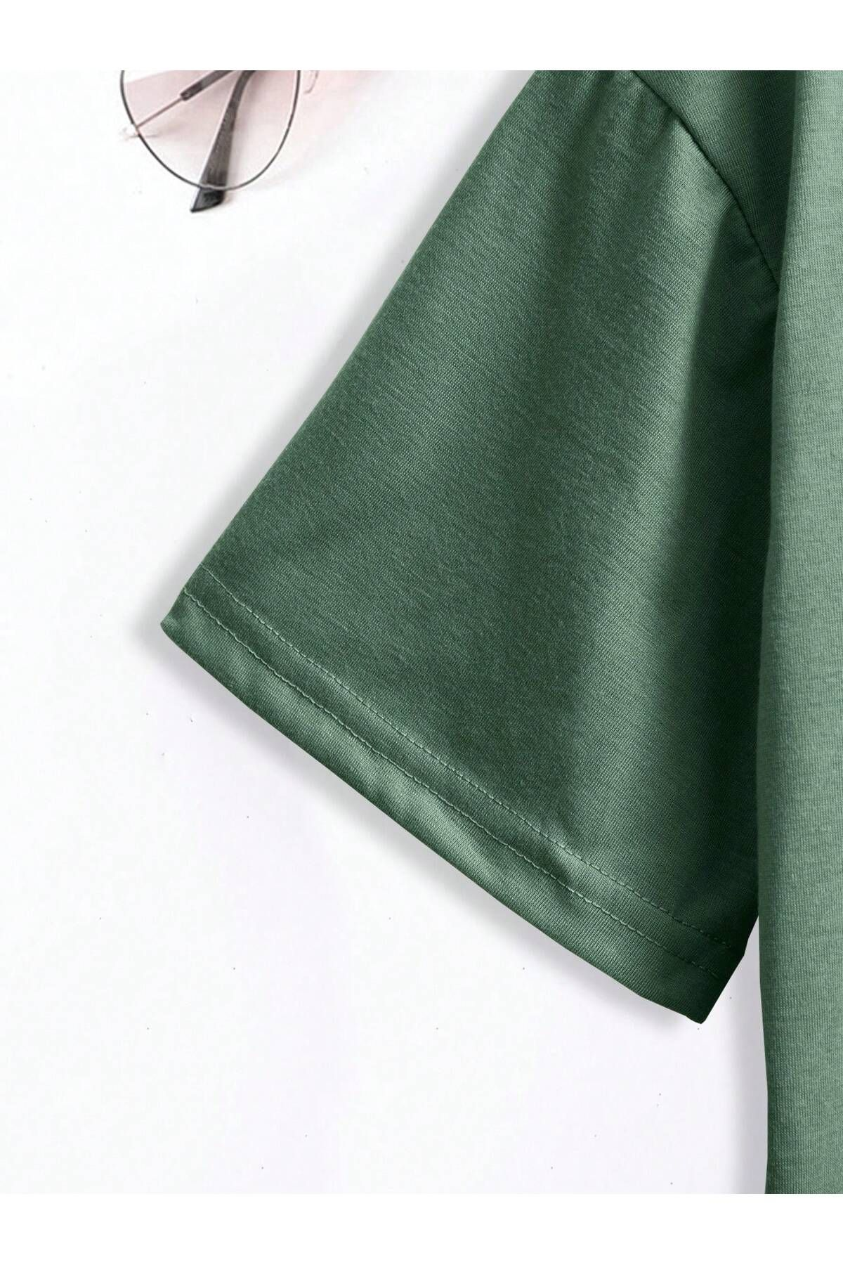 Green “Garden of Books” Floral Stack Graphic Tee – Book Lover’s T-Shirt